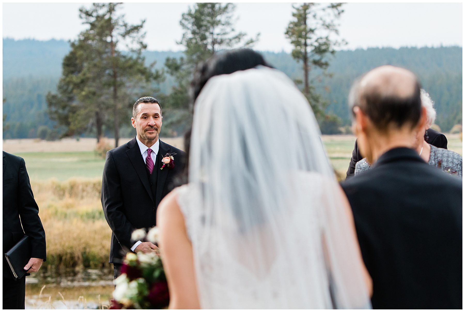 Portrait of the groom seeing the bride for the first time at the Sunriver Resort Fall Riverfront Wedding